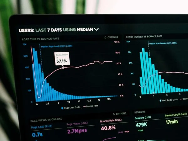 Laptop Screen Showing Data and Statistics Dashboard