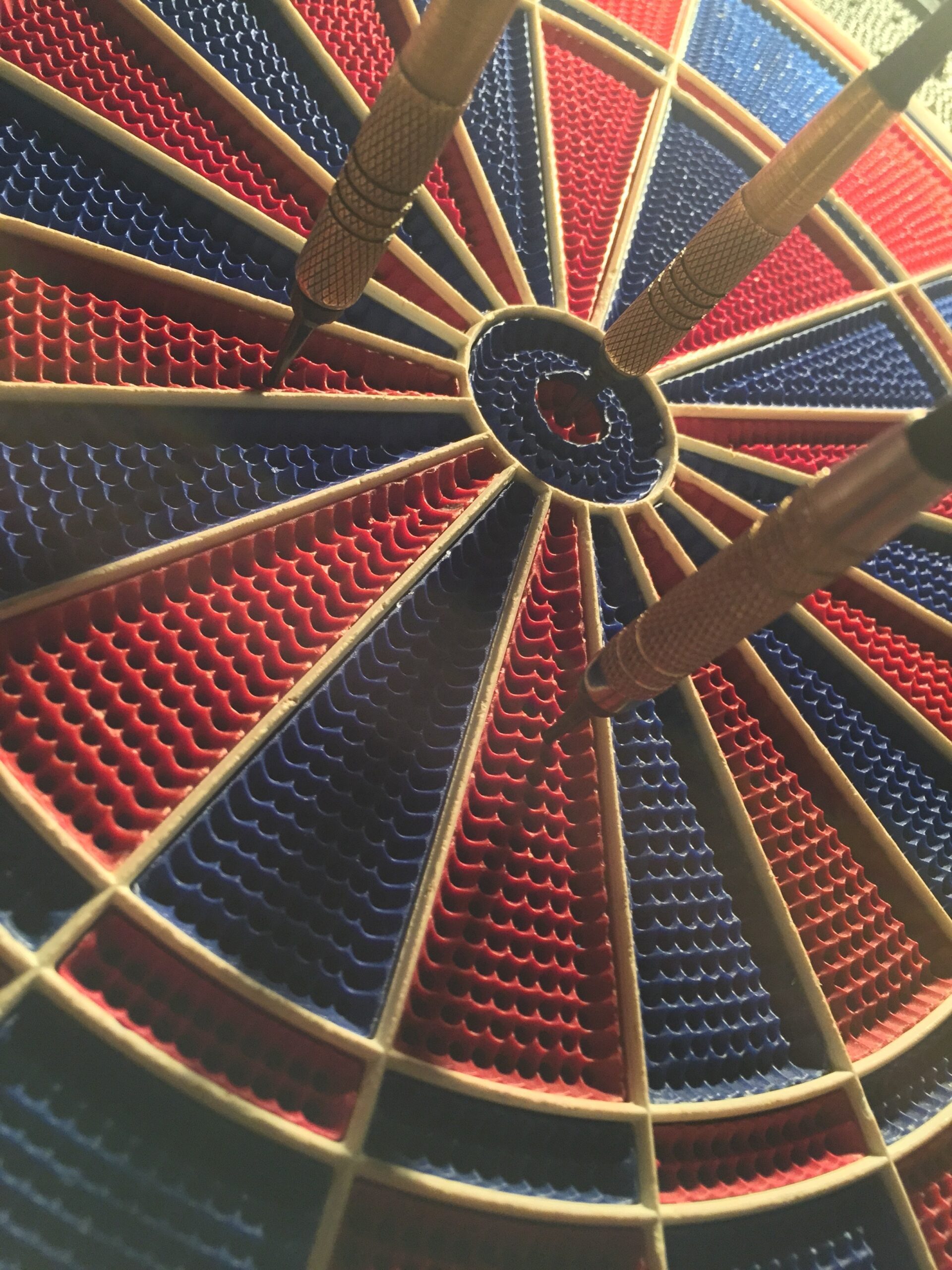 Darts Hitting the Target in a Game of Darts
