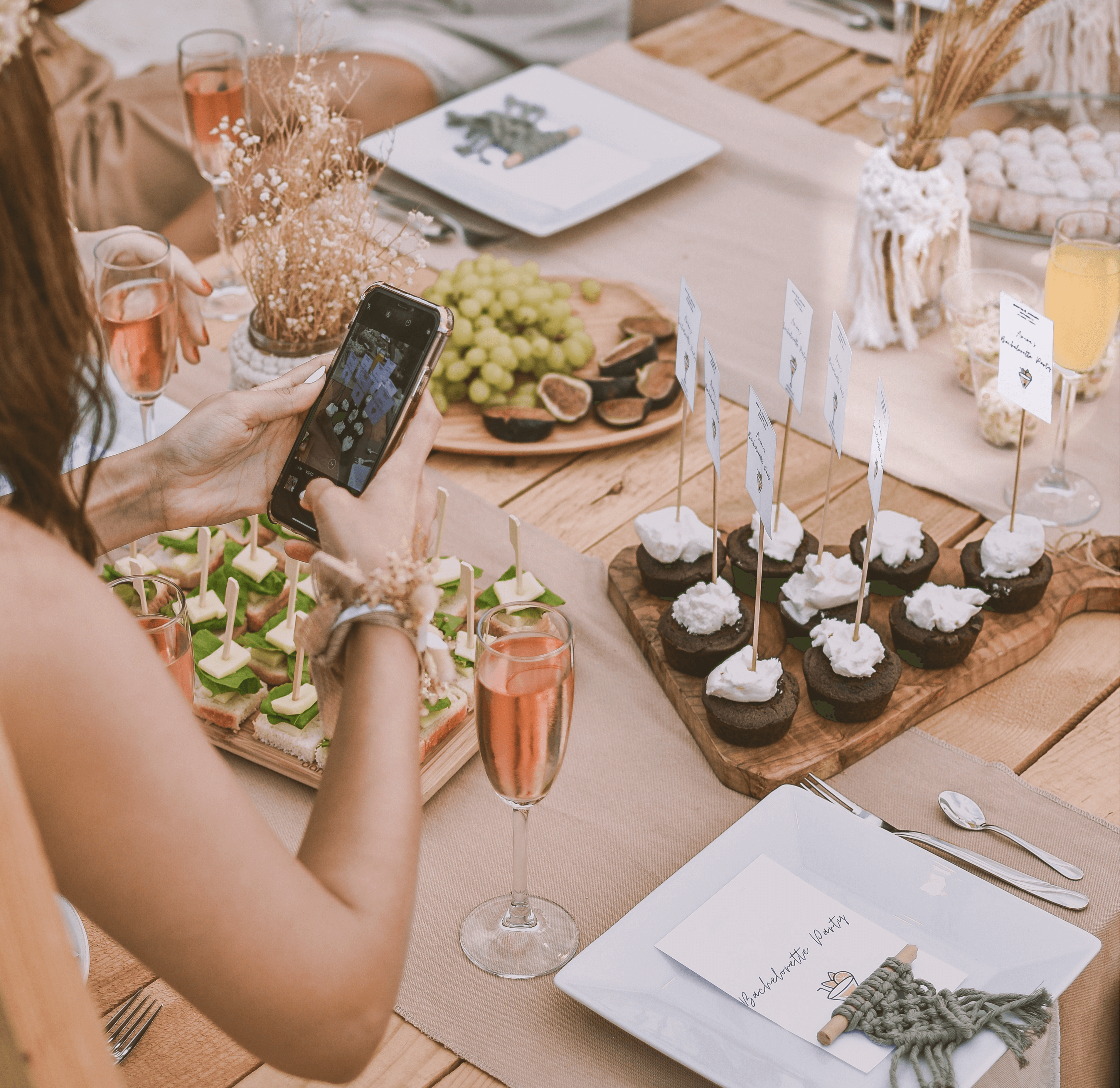 Woman taking a photo of dessert on mobile phone