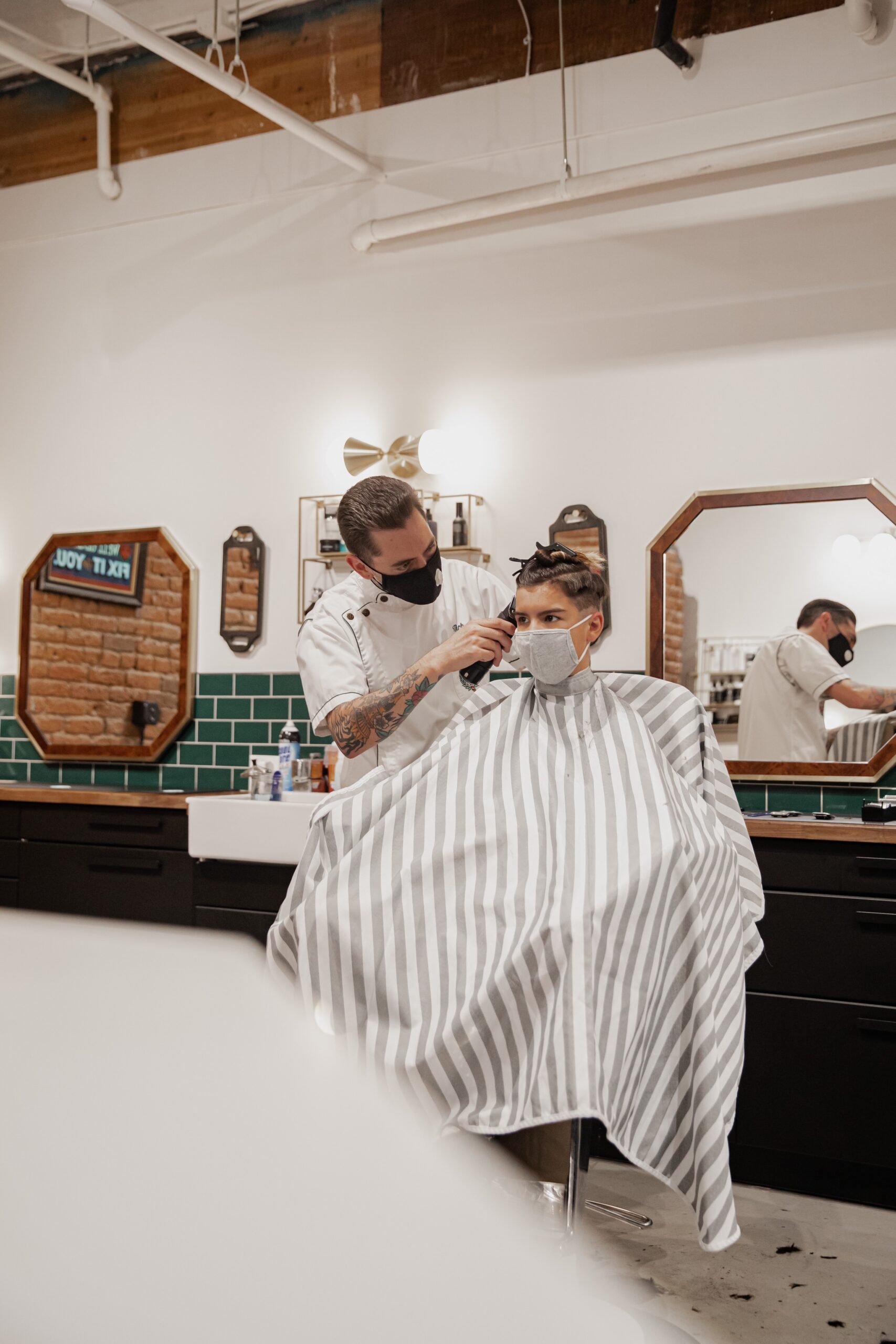 Barber Cutting a Boy's Hair