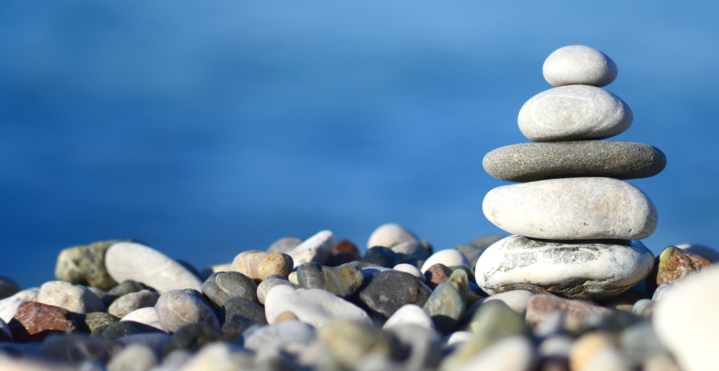 Balanced Stones in front of the ocean