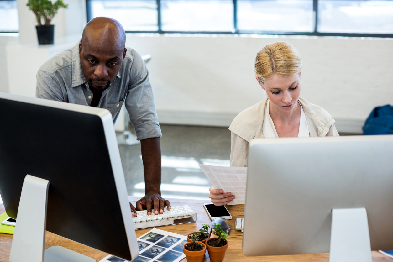 Two Business Colleagues Working Together