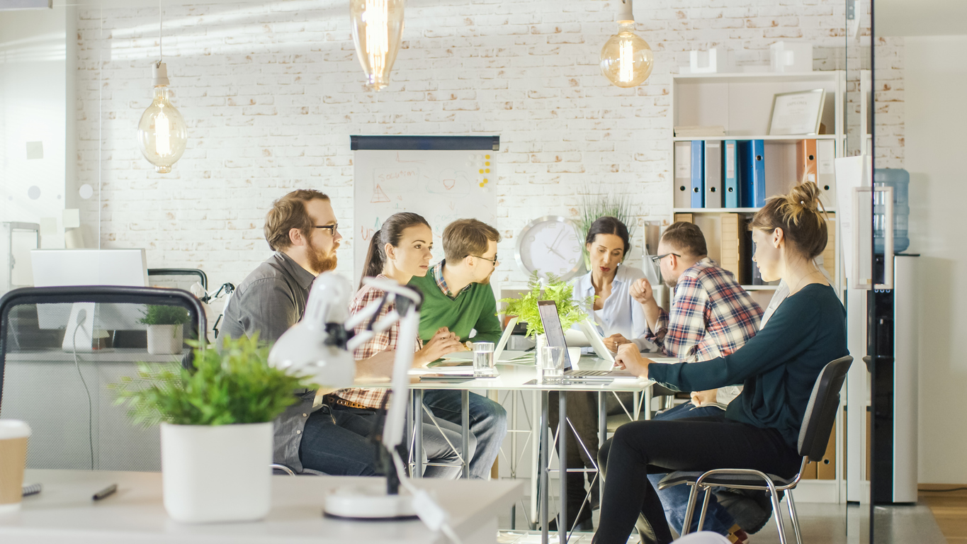 Group of professionals collaborating at a table